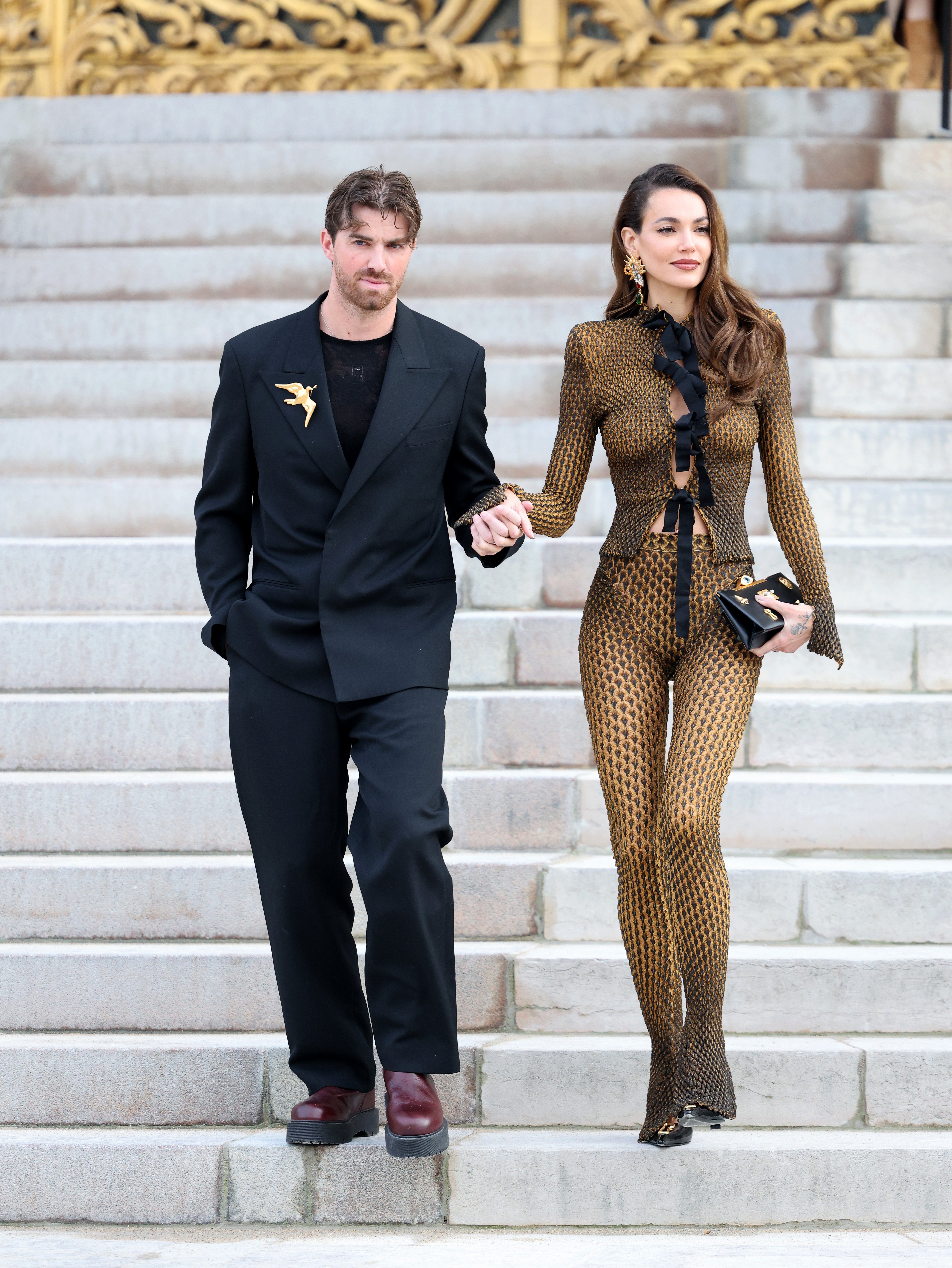 Andrew Taggart and Marianne Fonseca attend the Schiaparelli Haute Couture show during Paris Fashion Week.