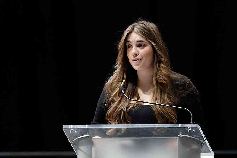 Jordyn Biffle, sister of Greg Biffle, speaks at the memorial service for Biffle and his family in Charlotte, N.C., Friday, Jan. 16, 2026. (AP Photo/Nell Redmond)