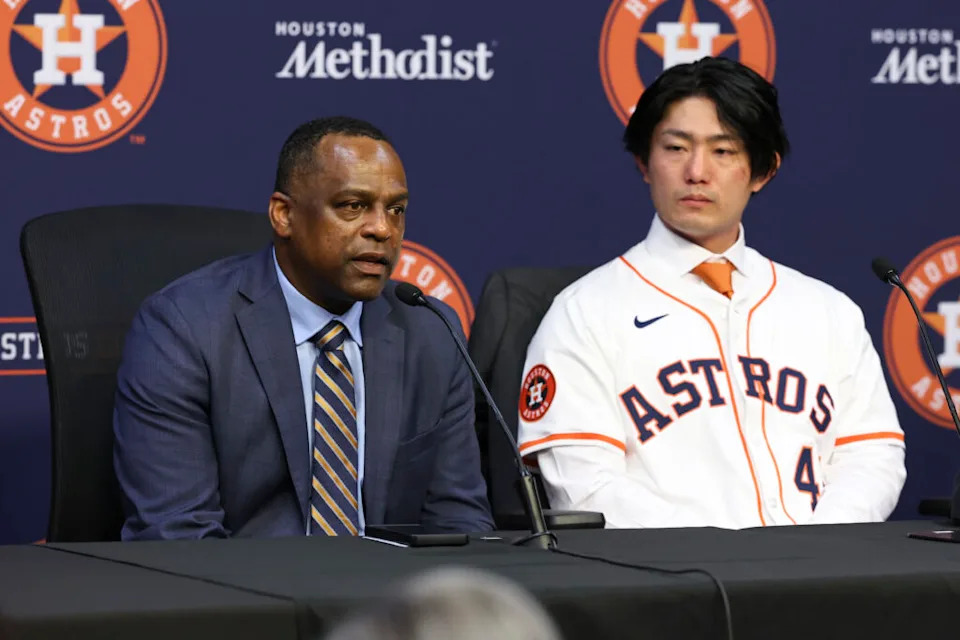 Jan 5, 2026; Houston, TX, USA; Houston Astros general manager Dana Brown (left) talks during a press conference to introduce Japanese pitcher Tatsuya Imai at Daikin Park. Mandatory Credit: Troy Taormina-Imagn Images