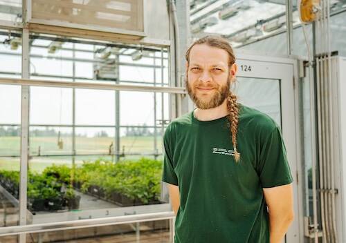 Andrew McKenzie-Gopsill, a research scientist with Agriculture and Agri-Food Canada has developed a potato vine crusher that can mitigate the spread of weed seed during harvest. PhotoL AAFC. 