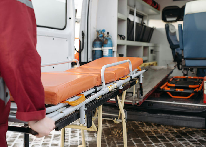 Medical stretcher being loaded into ambulance, highlighting worst things medical professionals have said to patients.