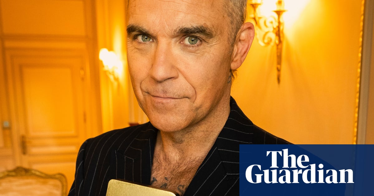 Robbie Williams breaks the Beatles’ record for UK No 1 albums, with 16th chart-topper | Robbie Williams