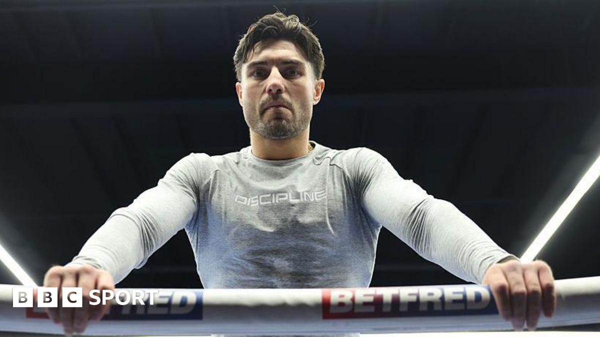 Josh Kelly leans over the ropes