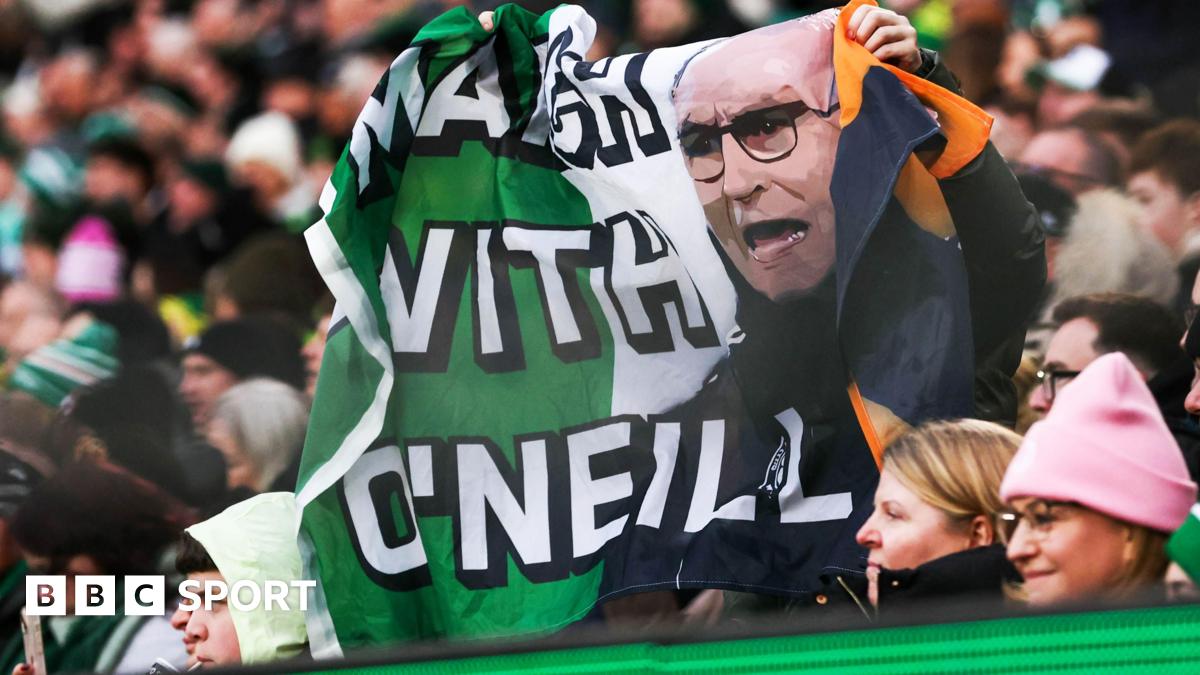 Celtic fans with a Martin O'Neill banner
