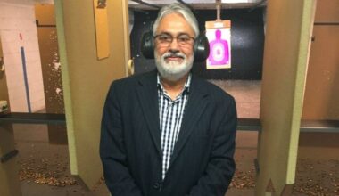 Vikram Bajwa poses for a photo at a gun range. Bajwa is asking Premier David Eby to introduce an emergency bill to expedite the issuance of 500 gun licences for himself and other Surrey residents. (Contributed to Surrey Now-Leader)