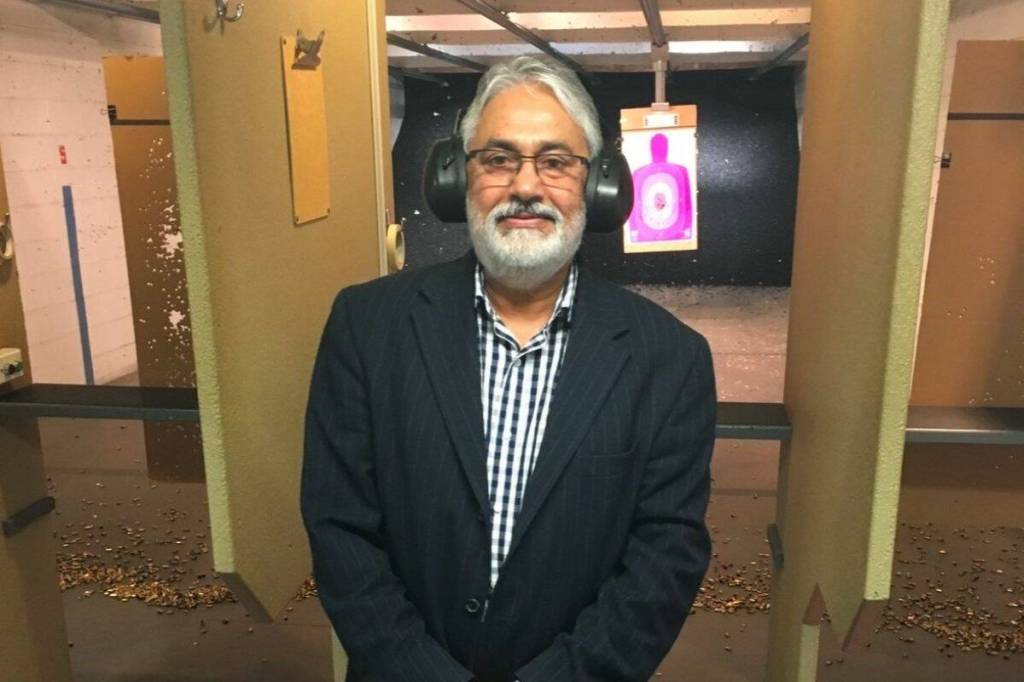 Vikram Bajwa poses for a photo at a gun range. Bajwa is asking Premier David Eby to introduce an emergency bill to expedite the issuance of 500 gun licences for himself and other Surrey residents. (Contributed to Surrey Now-Leader)