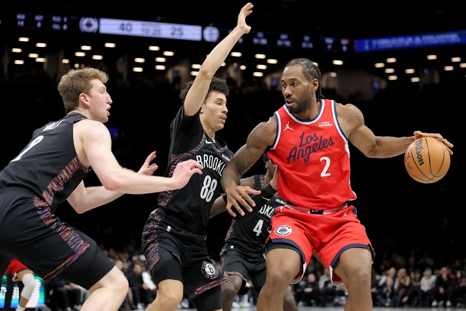 Los Angeles Clippers forward Kawhi Leonard (2) controls the ball against Brooklyn Nets forward Danny Wolf (2) and guards Nolan Traore (88) and Drake Powell (4) during the second quarter at Barclays Center in Brooklyn, New York on Jan. 9, 2026.