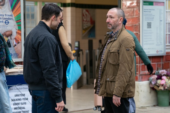 546946,TITLE:Eastenders Ross chats to Mark outside of the tube station in a scene from EastEnders
