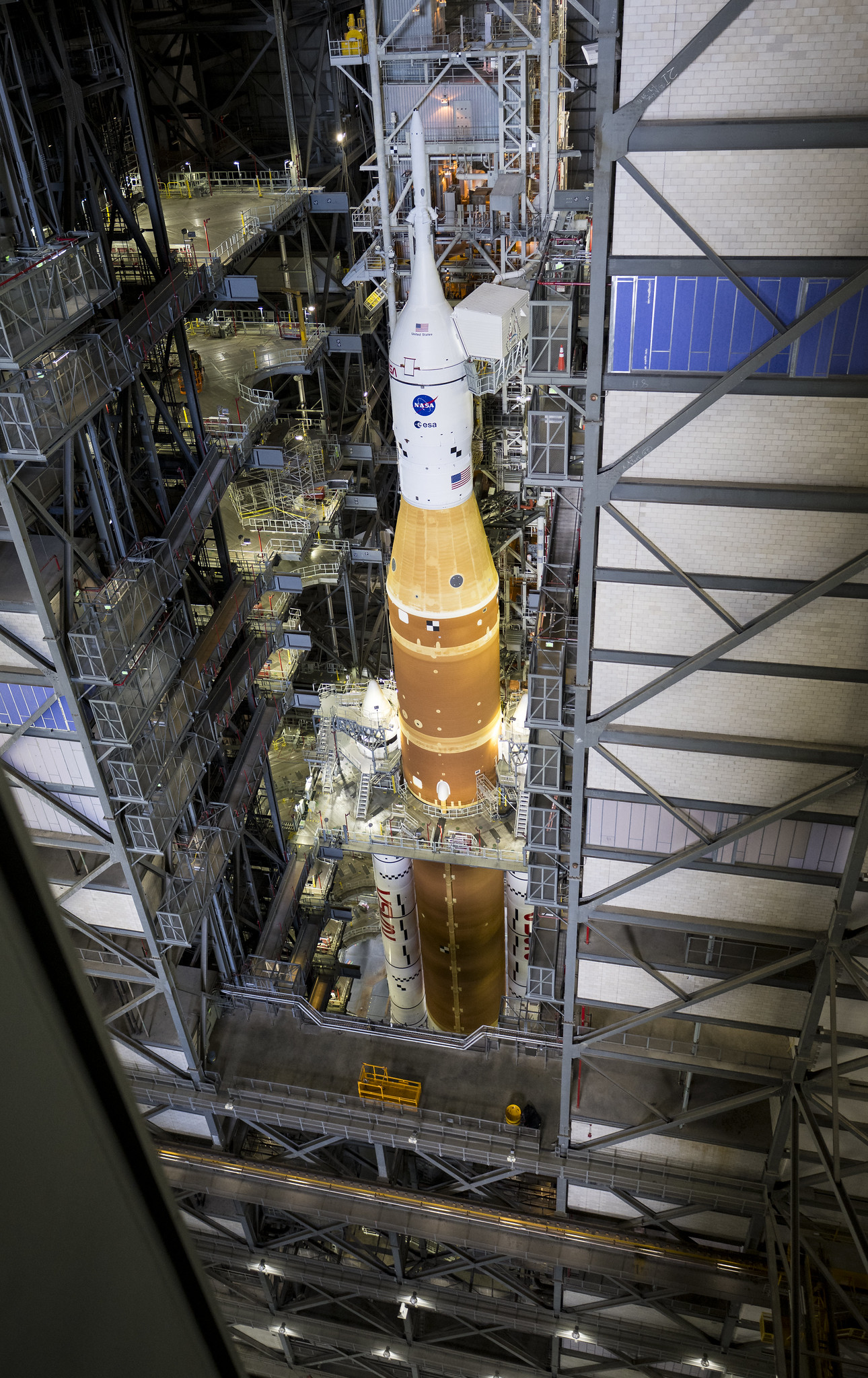 NASA’s Artemis II SLS (Space Launch System) rocket and Orion spacecraft, secured to the mobile launcher, is seen inside the Vehicle Assembly building as preparations continue for roll out to Launch Pad 39B, Thursday, Jan. 15, 2026 at NASA’s Kennedy Space Center in Florida. 