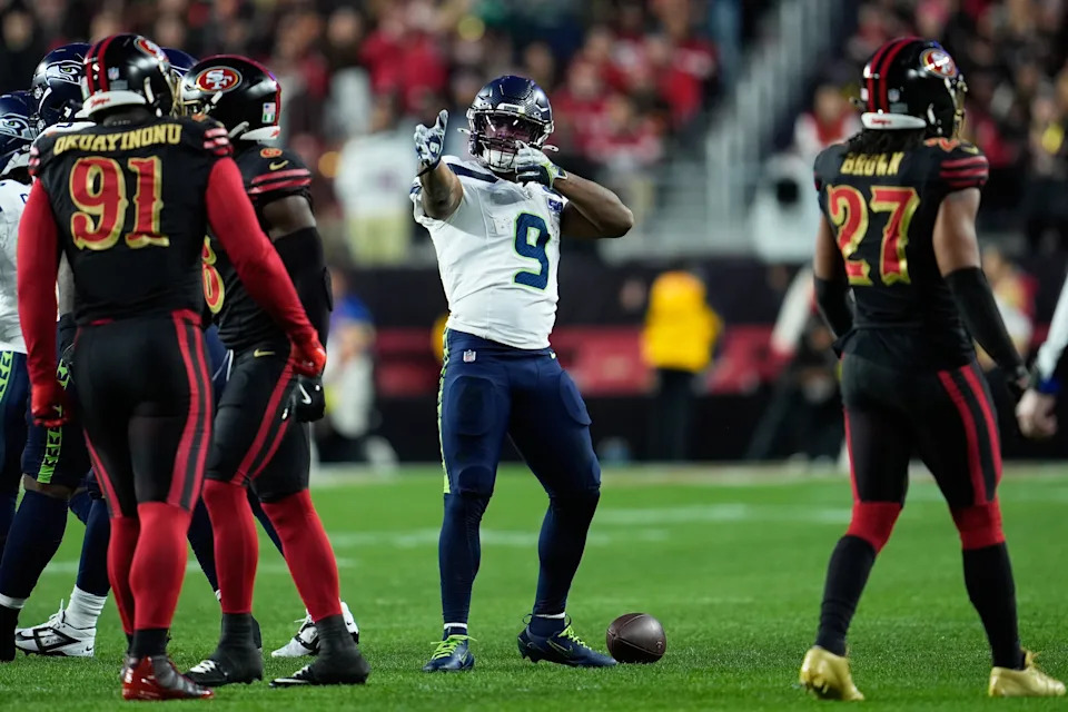 Seattle Seahawks running back Kenneth Walker III (9) gestures against the San Francisco 49ers during the first half of an NFL football game in Santa Clara, Calif., Saturday, Jan. 3, 2026. (AP Photo/Godofredo A. Vásquez)