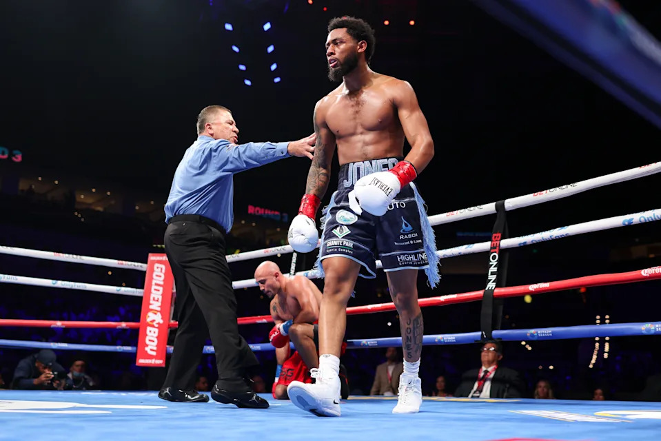 FORT WORTH, TEXAS - NOVEMBER 08: Amari Jones (L) reacts after knocking down Shady Gamhour (R) at Dickies Arena on November 08, 2025 in Fort Worth, Texas. (Photo by Cris Esqueda/Golden Boy/Getty Images)