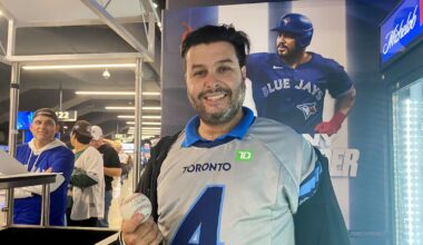 Blue Jays fan who caught Springer Dinger makes $30K after auction