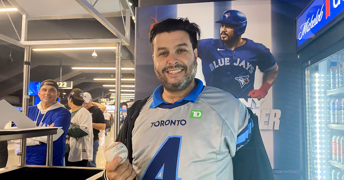 Blue Jays fan who caught Springer Dinger makes $30K after auction