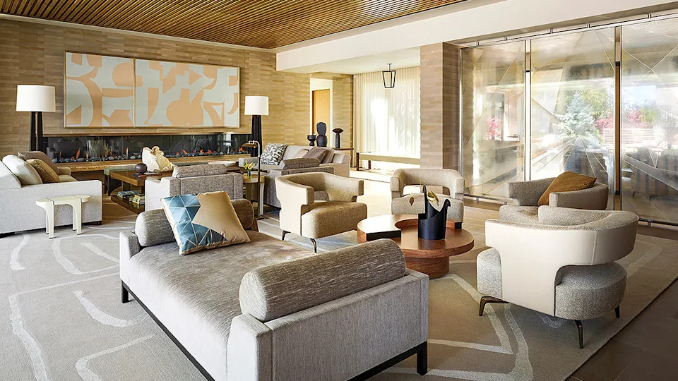 An elgomise triptych mural with three layers of glass in the living room.