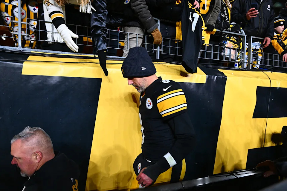 PITTSBURGH, PENNSYLVANIA - JANUARY 12: Aaron Rodgers #8 of the Pittsburgh Steelers walks off the field after losing to the Houston Texans in an NFL wild card playoff game at Acrisure Stadium on January 12, 2026 in Pittsburgh, Pennsylvania. (Photo by Joe Sargent/Getty Images)
