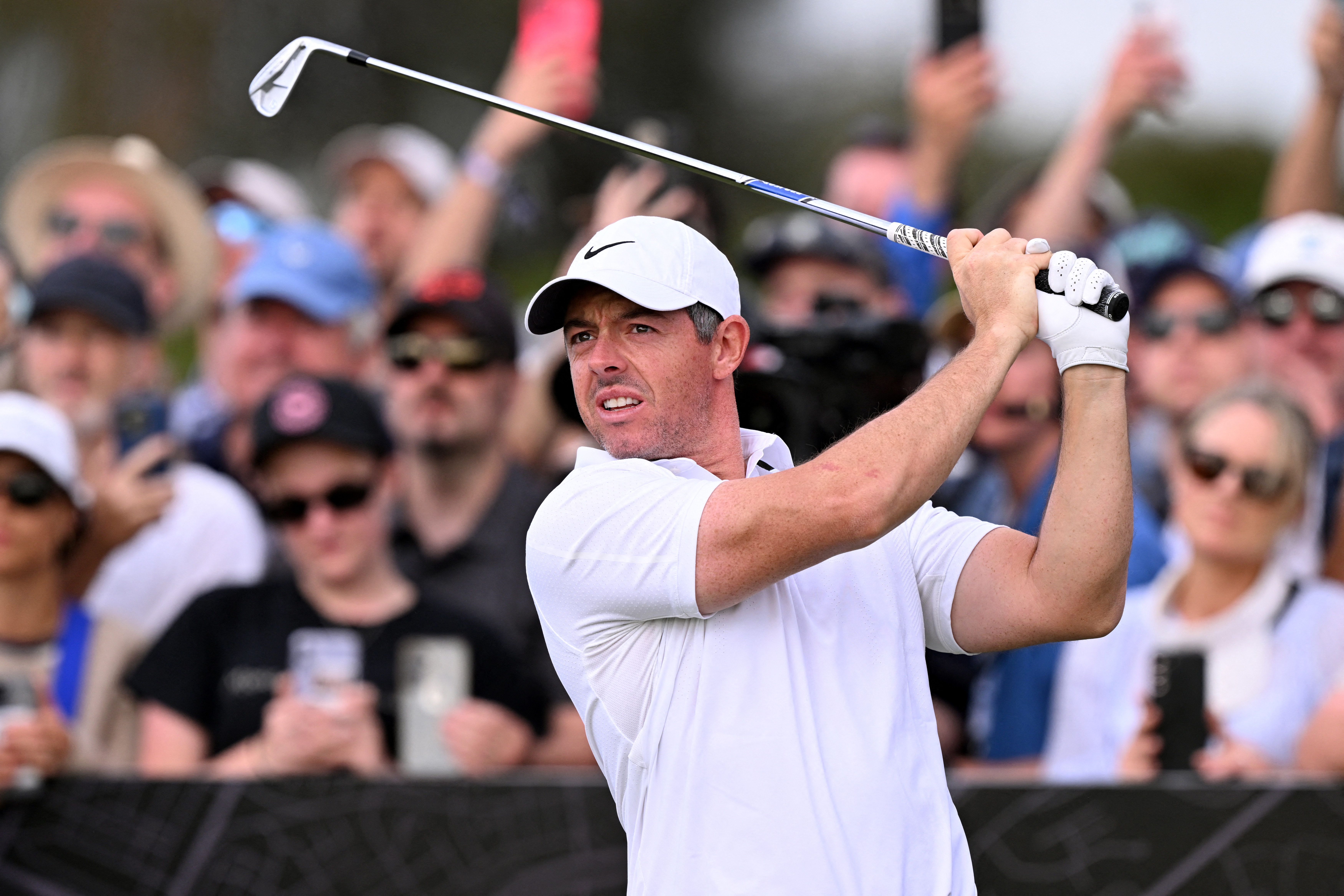 Rory McIlroy hits an iron off the tee