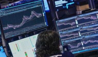 Wall Street slumps as bank and tech stocks fall