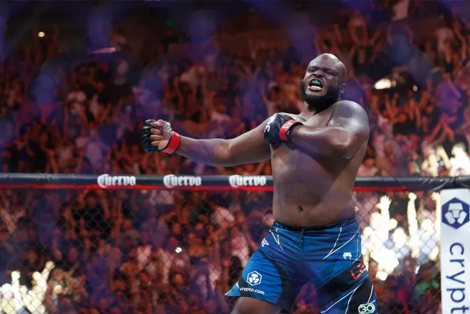 Jul 29, 2023; Salt Lake City, Utah, USA; Derrick Lewis (red gloves) reacts to defeating Marcos Rogerio De Lima (blue gloves) during UFC 291 at Delta Center. Mandatory Credit: Jeff Swinger-USA TODAY Sports
