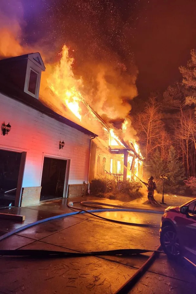 Lucia-Riverbend Fire Department/Facebook Dennis Hamlin's home in a blaze.