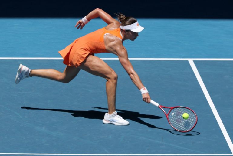 USA's Iva Jovic hits a return to Belarus' Aryna Sabalenka during their women's singles quarter-final match on day ten of the Australian Open tennis tournament in Melbourne on January 27, 2026. (Photo by DAVID GRAY / AFP) / -- IMAGE RESTRICTED TO EDITORIAL USE - STRICTLY NO COMMERCIAL USE --