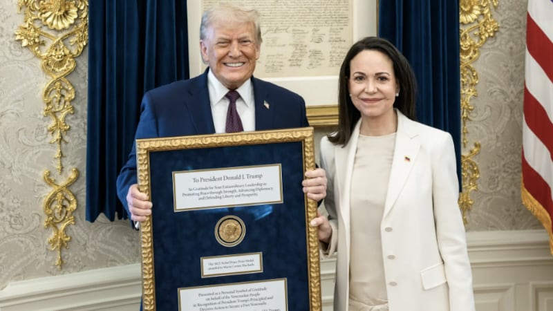 Venezuelan opposition leader Maria Corina Machado presents Donald Trump with her Nobel Peace Prize.