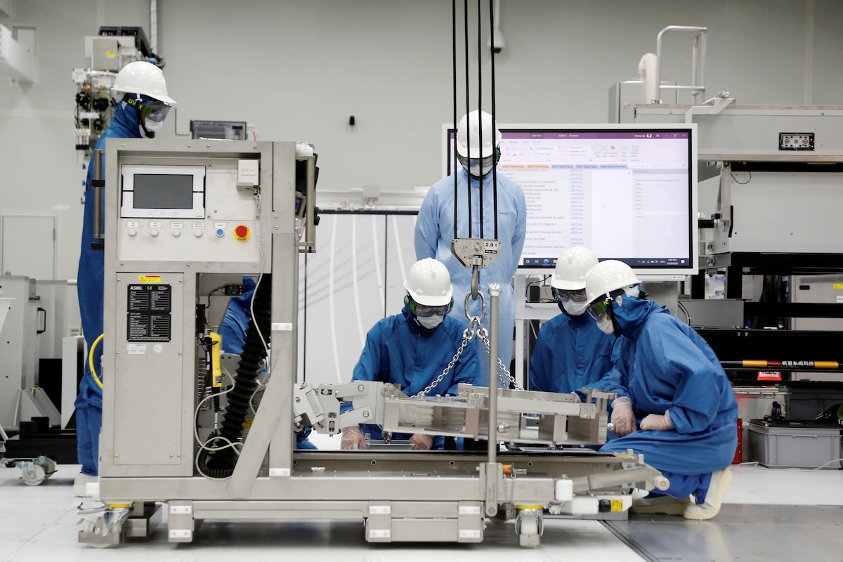 ASML lifts 2026 outlook on record AI chip orders, plans 1,700 management job cuts