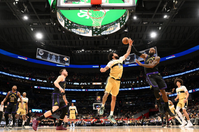Doncic and James lead the way, and the Lakers shoot 61% from the field in a 142-111 rout of Wizards