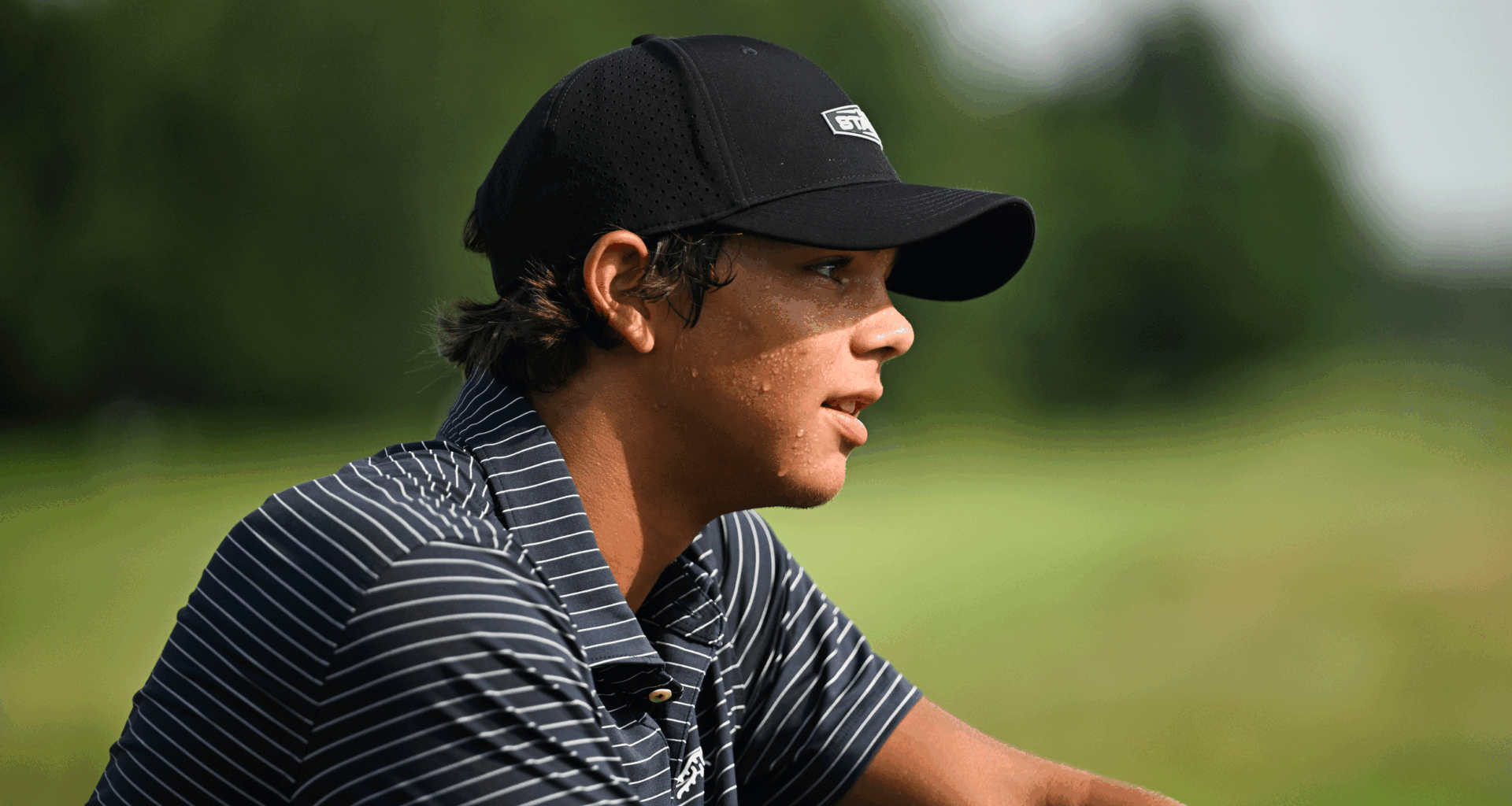 Charlie Woods looks to the right during the Junior PGA Championship in 2025