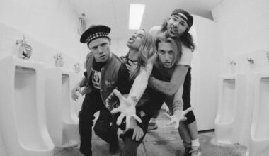 Red Hot Chili Peppers clowning around in a urinal in Japan