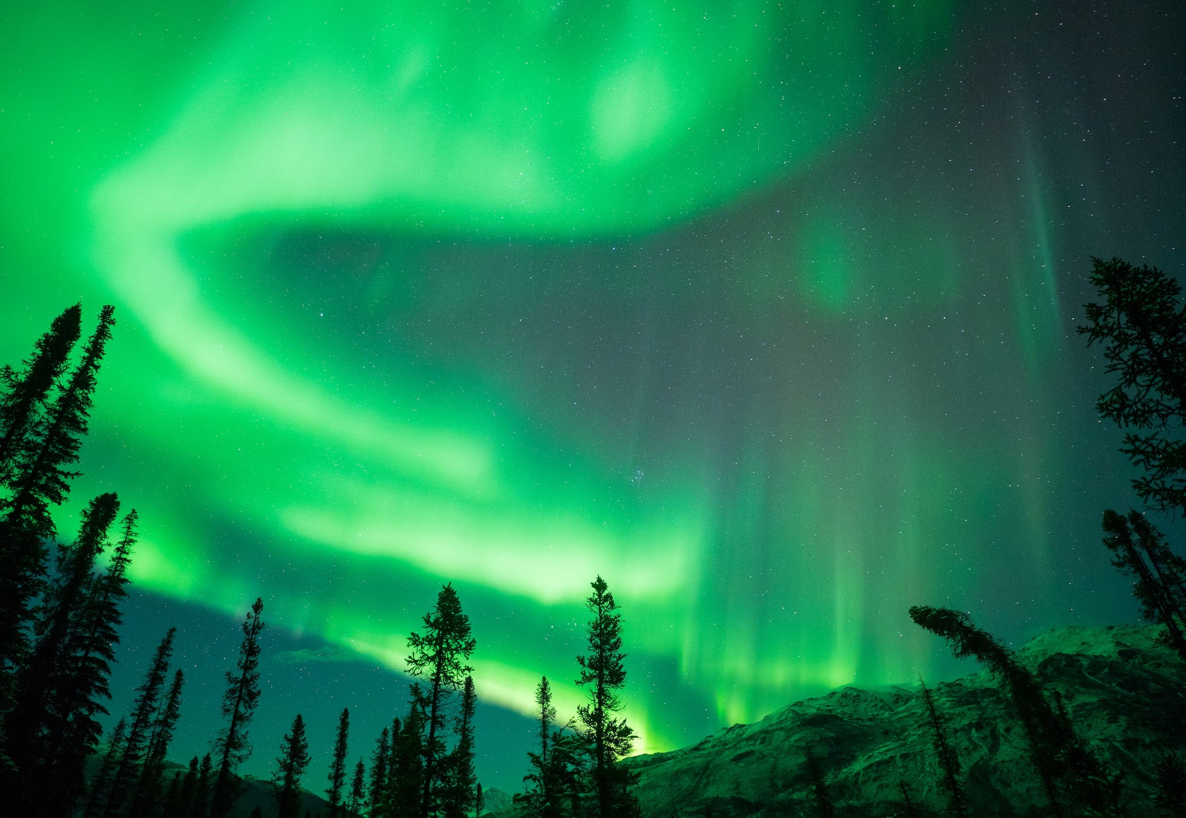Aurora over Brooks Range at Arctic Hive in Wiseman Alaska
