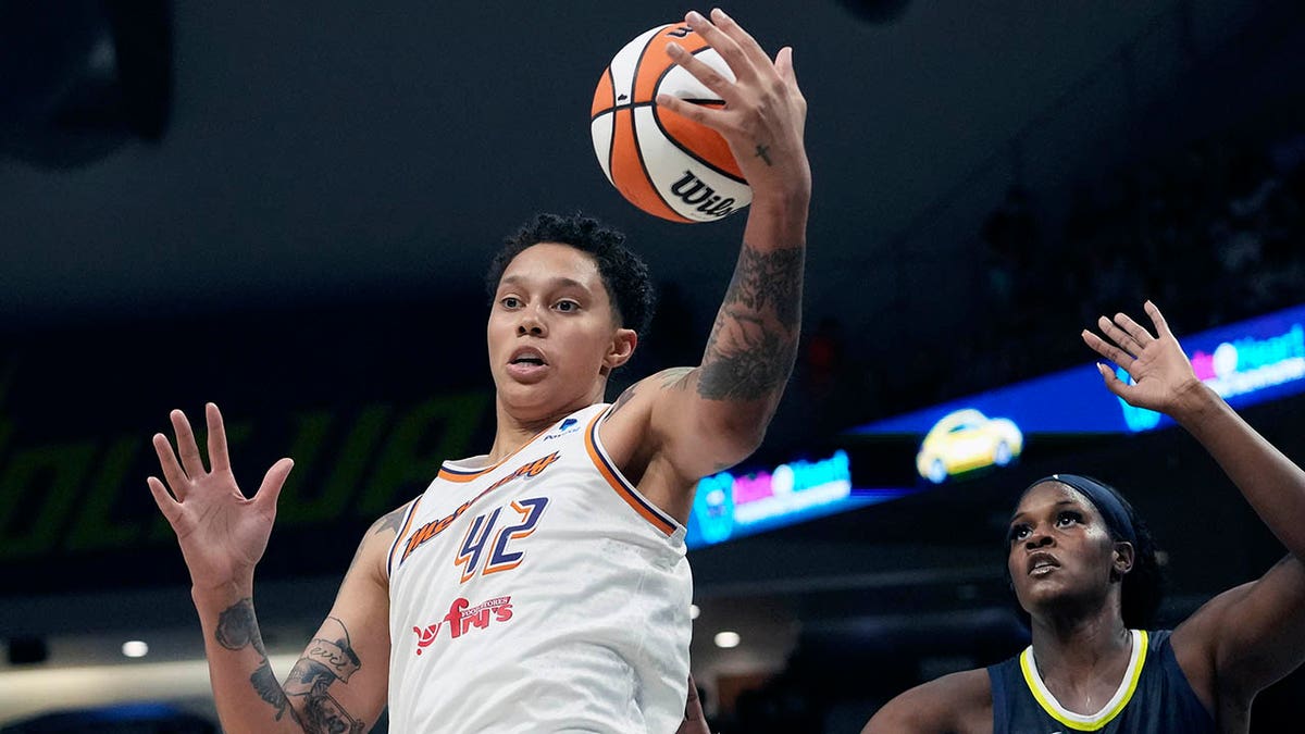 Brittney Griner grabs a rebound