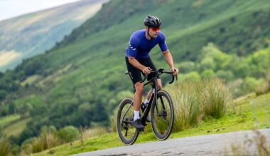 Male cyclist in blue top riding the Cervélo S5 2025 (Dura-Ace Di2) aero road bike
