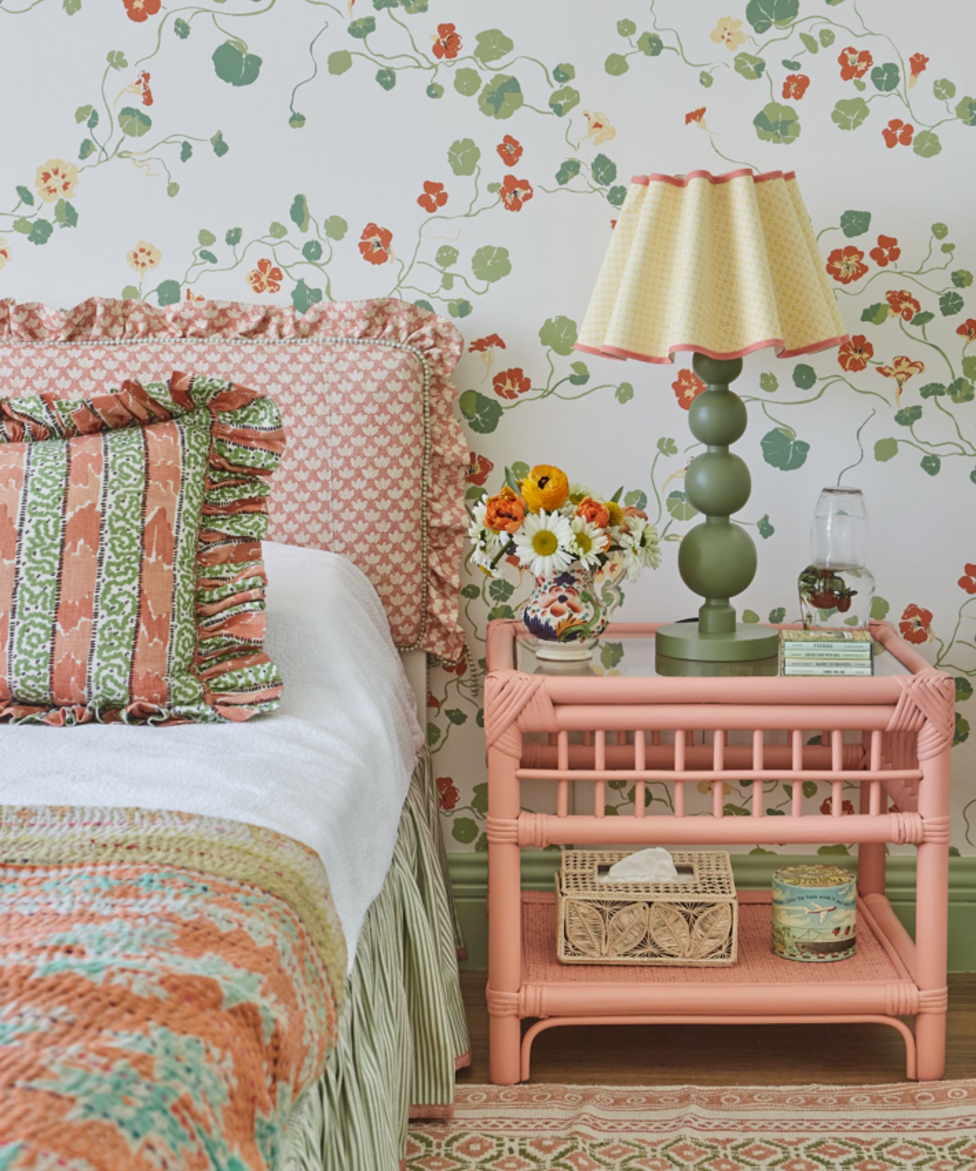 floral pink and green bedroom with geranium print floral wallpaper