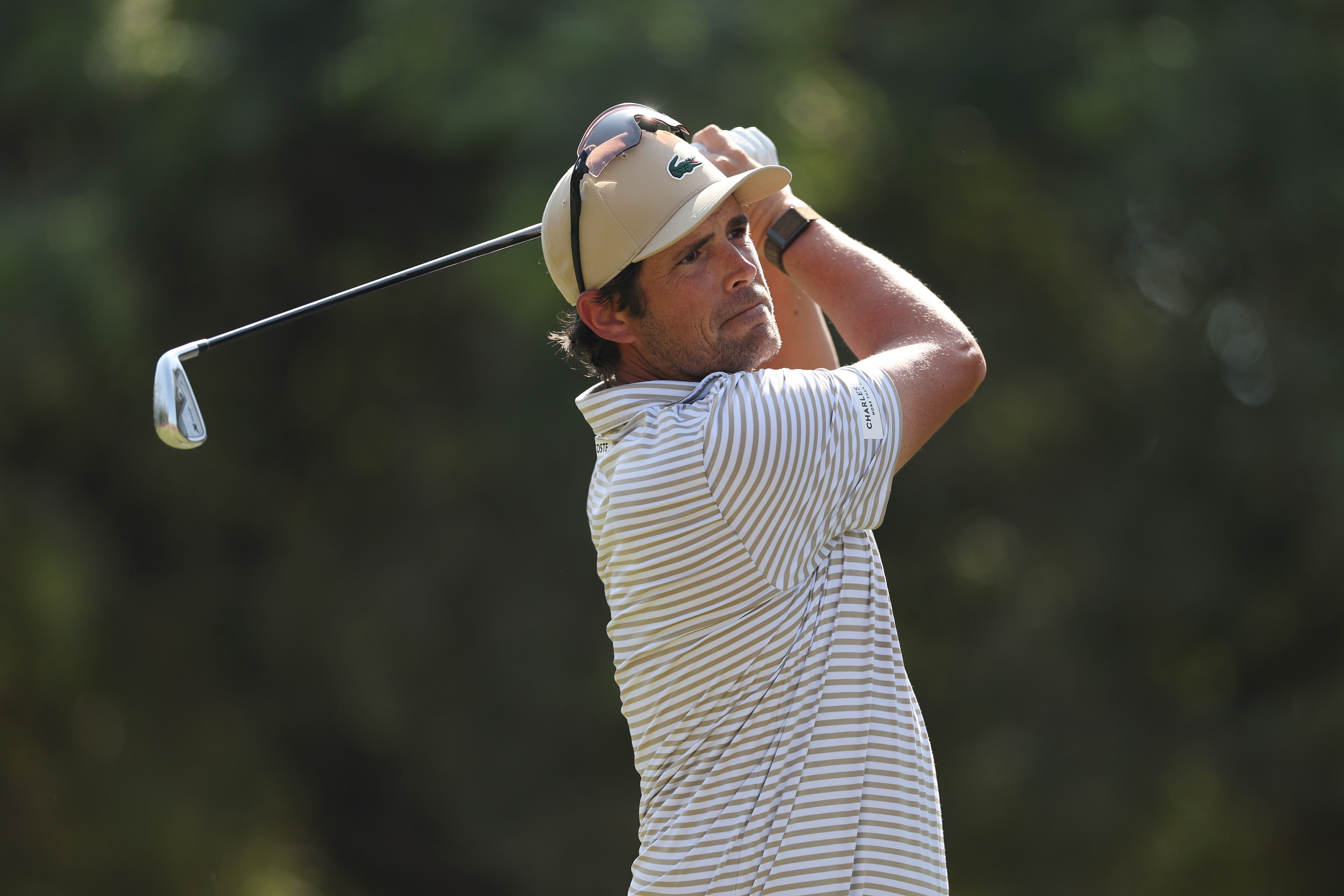 Nacho Elvira hits a utility iron