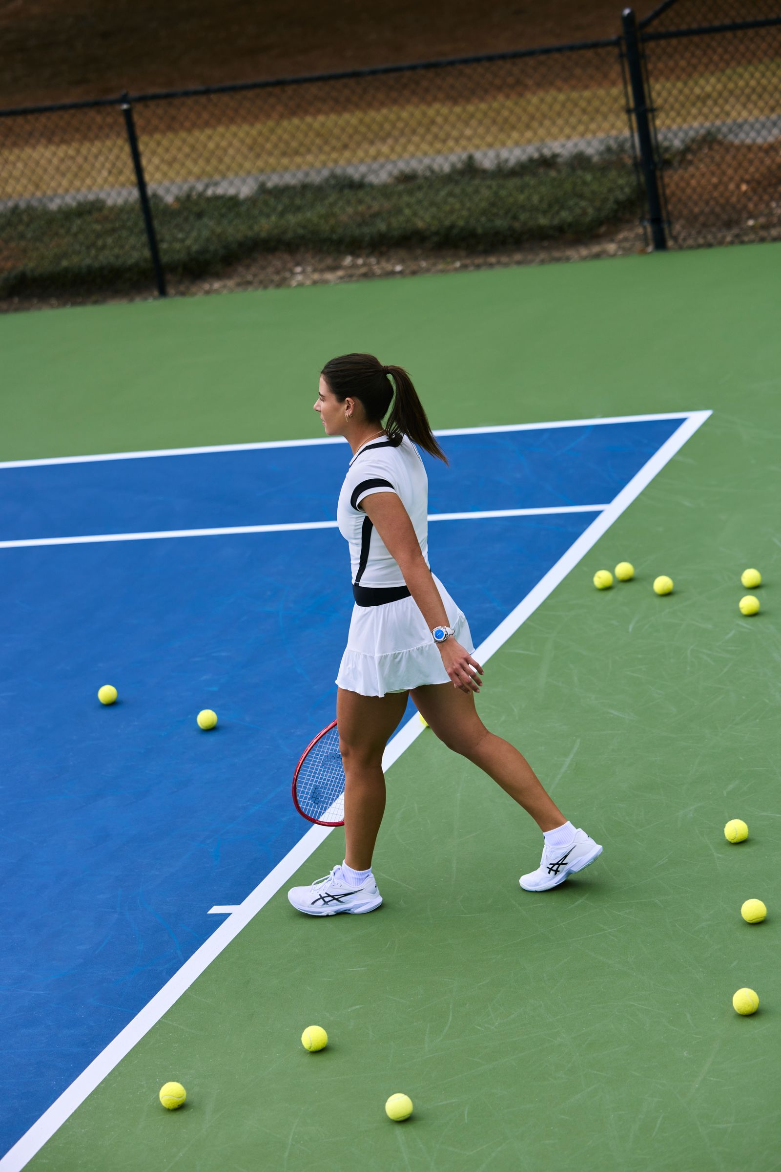 Image may contain Ágatha Bednarczuk Ball Sport Tennis Tennis Ball Person Teen Playing Tennis and Racket