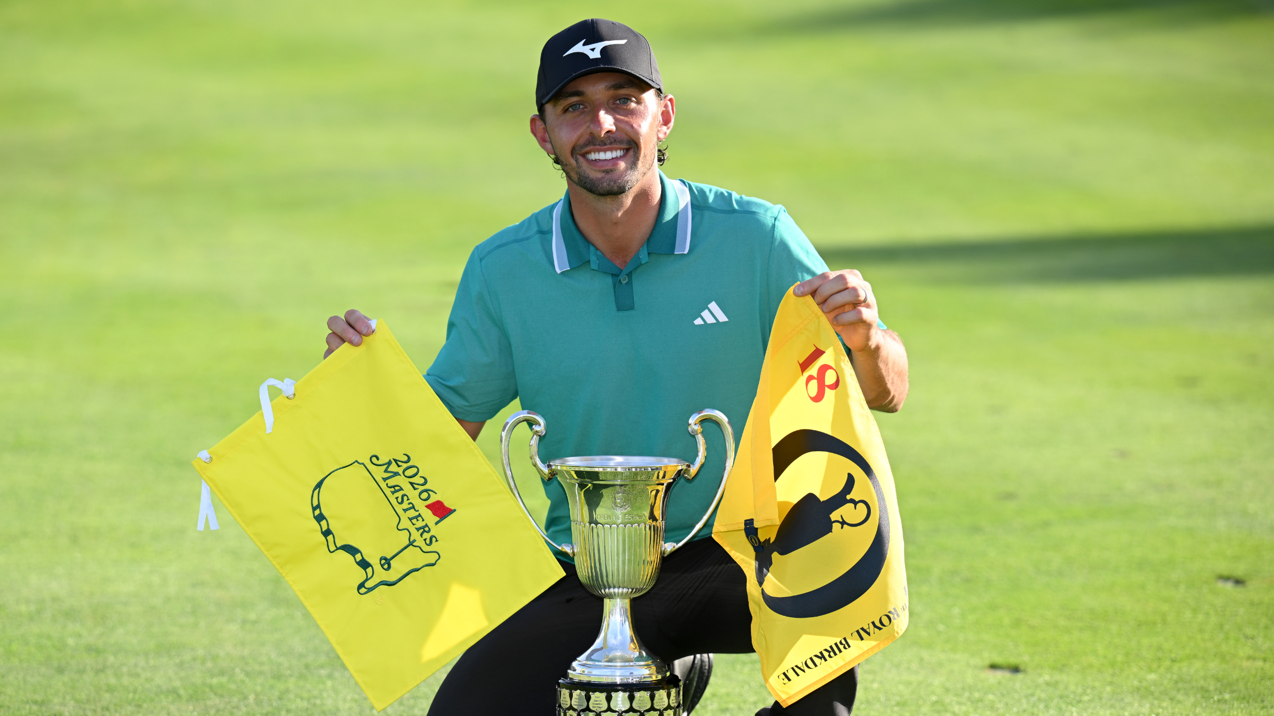 Marco Penge with flags for The Masters and The Open