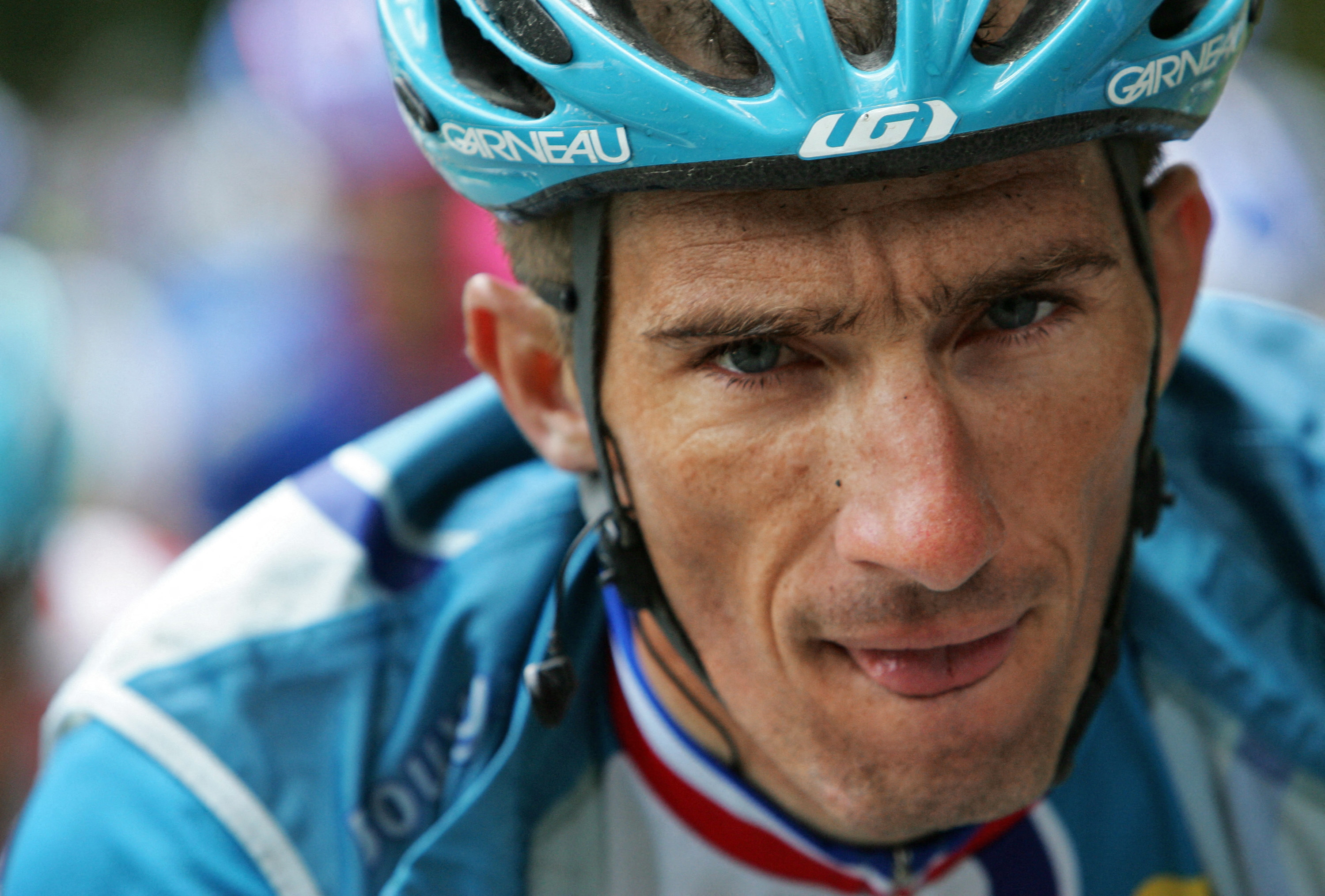 Portrait of France's Didier Rous (Bouygues Telecom/Fra) taken during the 225 km fifth stage of the 93rd Tour de France cycling race from Beauvais to Caen, 06 July 2006. France will play against Italy in the 2006 Football World Cup 2006 final match in Berlin next 09 July. POOL PHOTO / FRANCK FIFE (Photo by FRANCK FIFE / POOL / AFP)