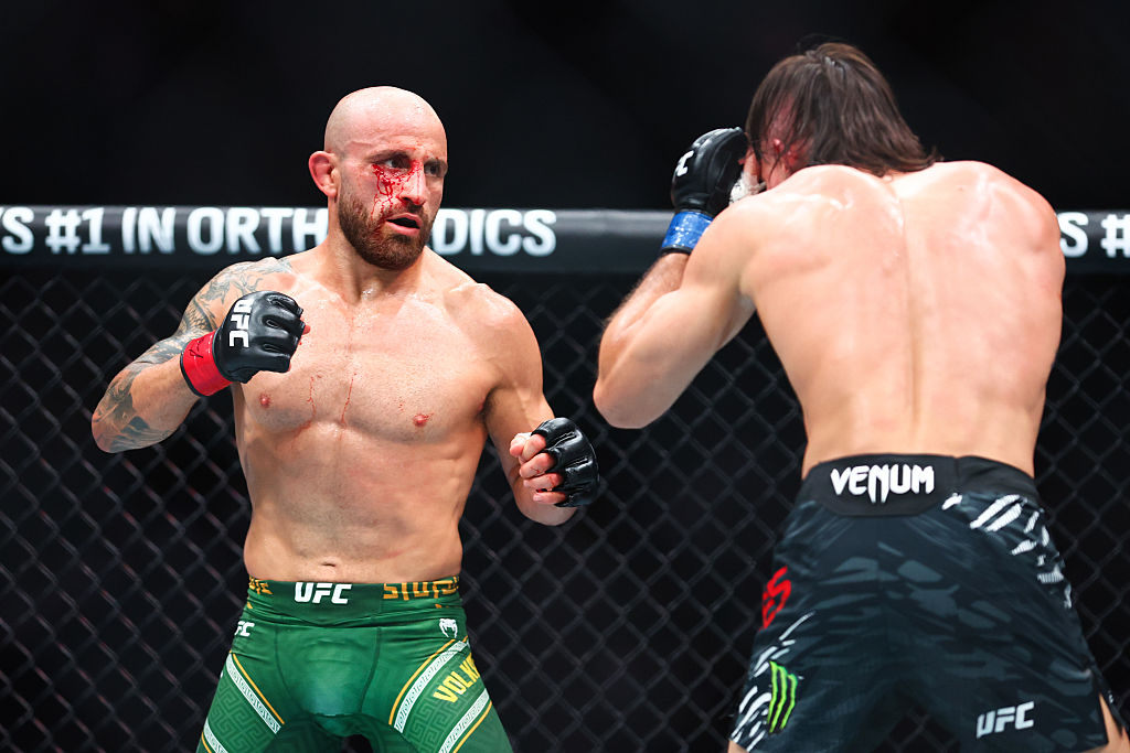 MIAMI, FLORIDA - APRIL 12: Alexander Volkanovski of Australia (L) fights Diego Lopes of Brazil in a featherweight title fight during UFC 314 at Kaseya Center on April 12, 2025 in Miami, Florida. (Photo by Megan Briggs/Getty Images)
