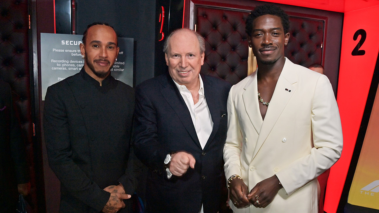 Hans Zimmer (center), flanked by producer and driver Lewis Hamilton (left) and star Damson Idris.
