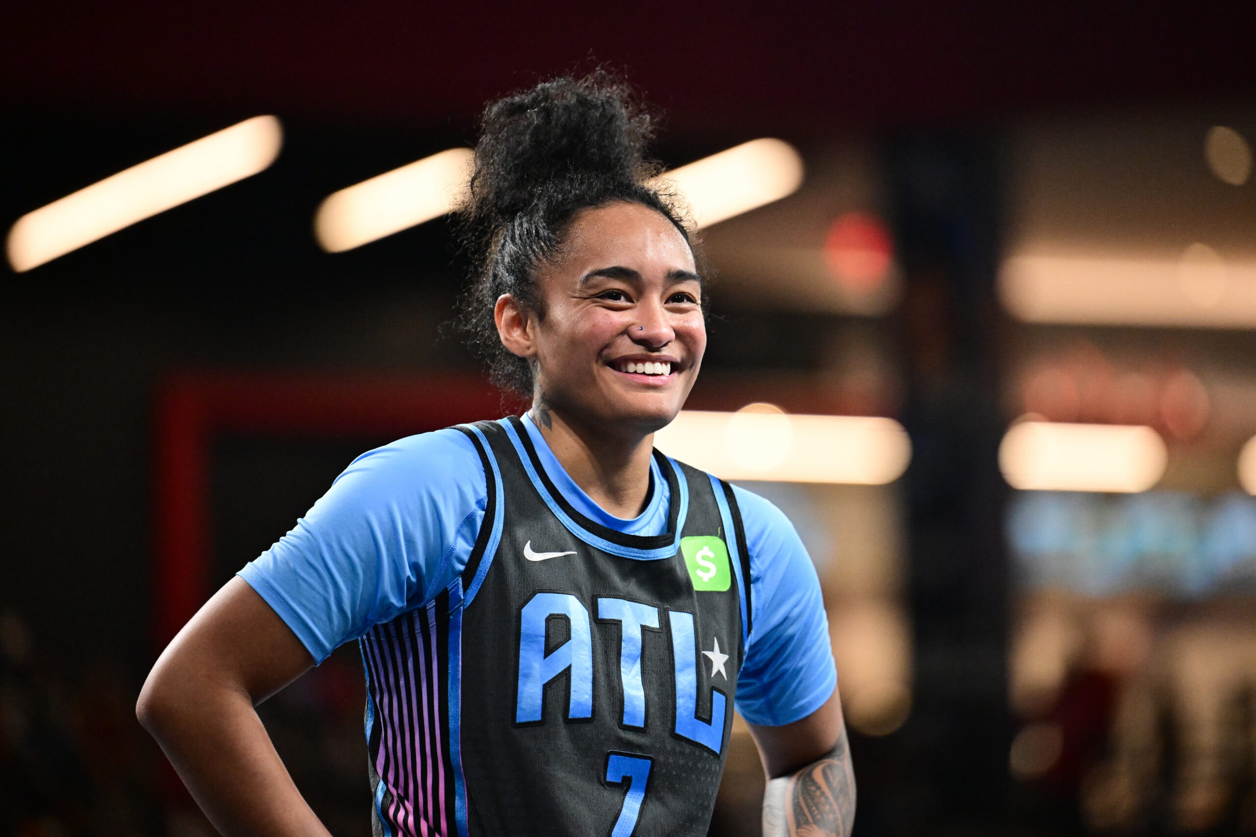 Te-Hina Paopao #2 of the Atlanta Dream smiles during the game against the Dallas Wings on August 29, 2025 at Gateway Center Arena at College Park in Atlanta, Georgia