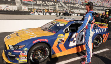 BRISTOL, TENNESSEE - SEPTEMBER 11: Garrett Mitchell, also known as Cleetus McFarland, driver of the #30 Kenetik Ford waves to fans on the grid prior to the ARCA Menards Series Bush's Beans 200 at Bristol Motor Speedway on September 11, 2025 in Bristol, Tennessee. (Photo by Jonathan Bachman/Getty Images)
