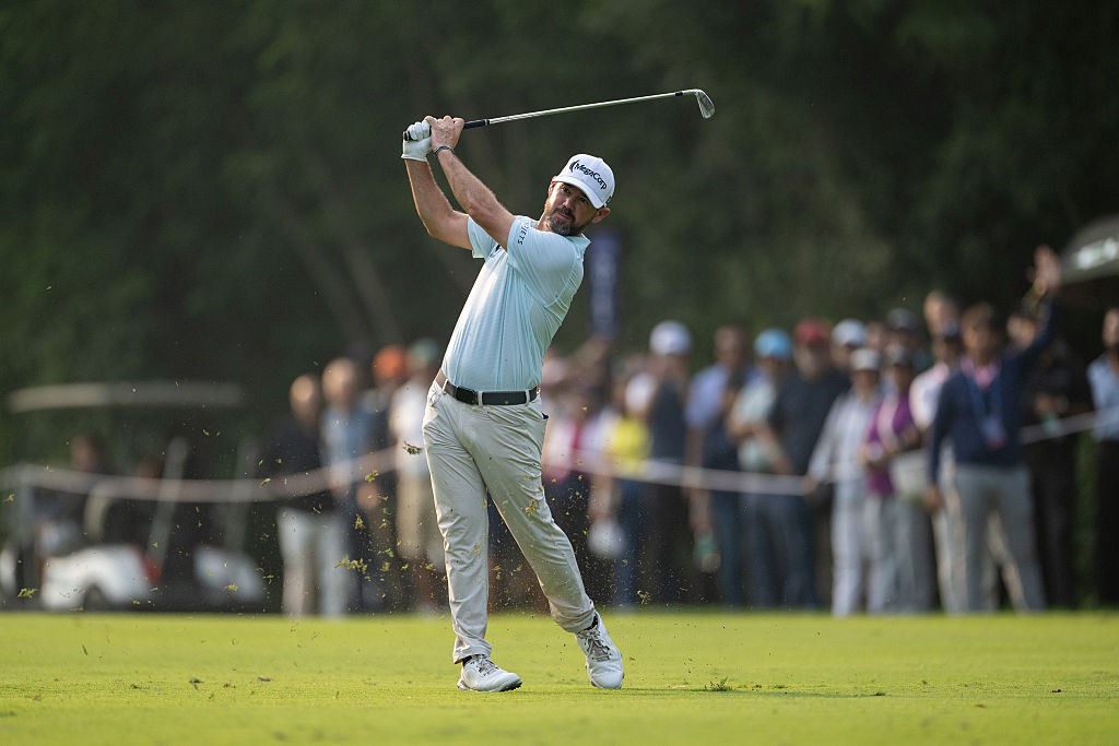 NEW DELHI, INDIA - OCTOBER 18: Brian Harman of the United States plays his approach on hole 16 on day three of the DP World India Championship 2025 at Delhi Golf Club on October 18, 2025 in New Delhi, India.