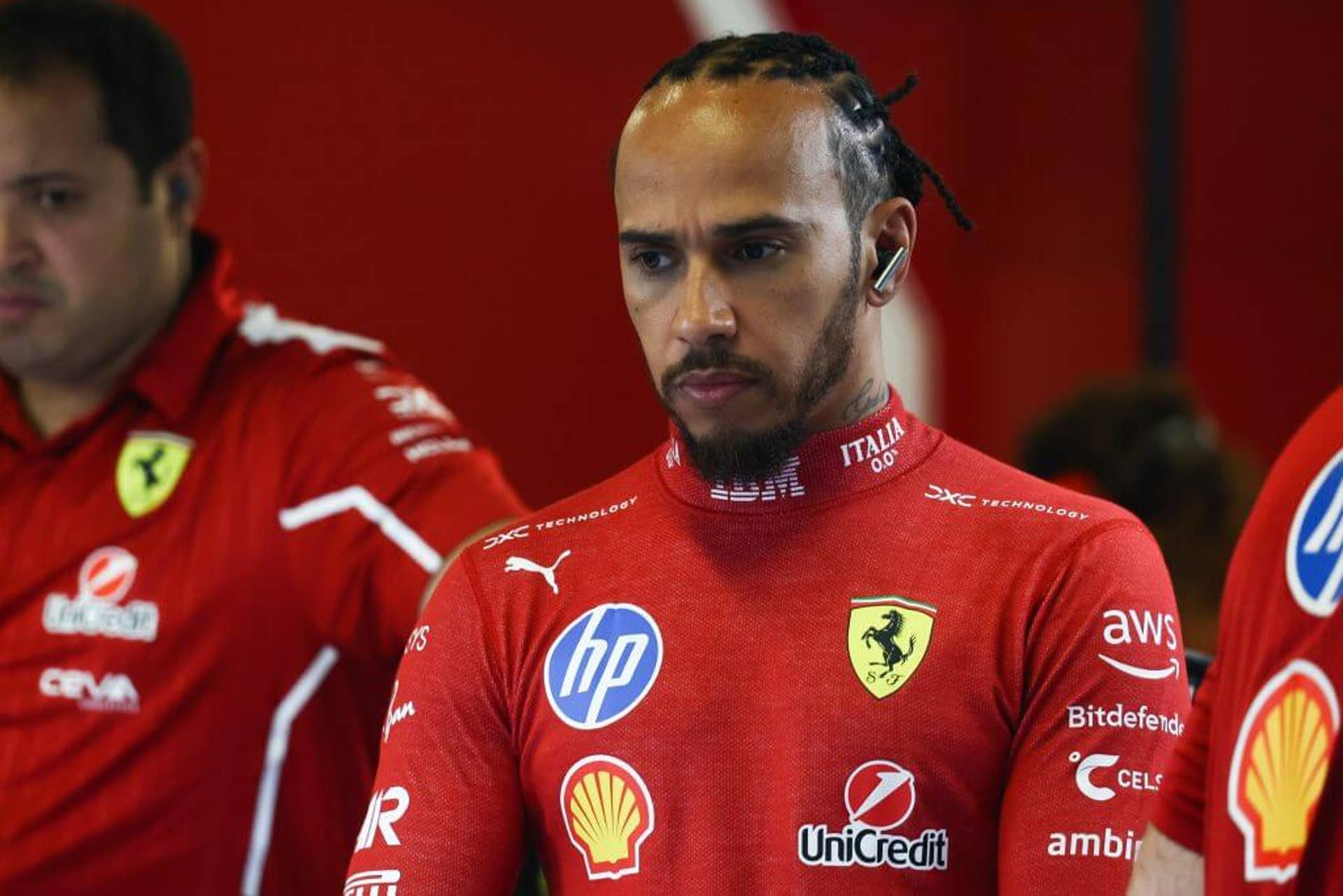 An image of Ferrari driver Lewis Hamilton looking on before qualifying at the Formula 1 Abu Dhabi Grand Prix.