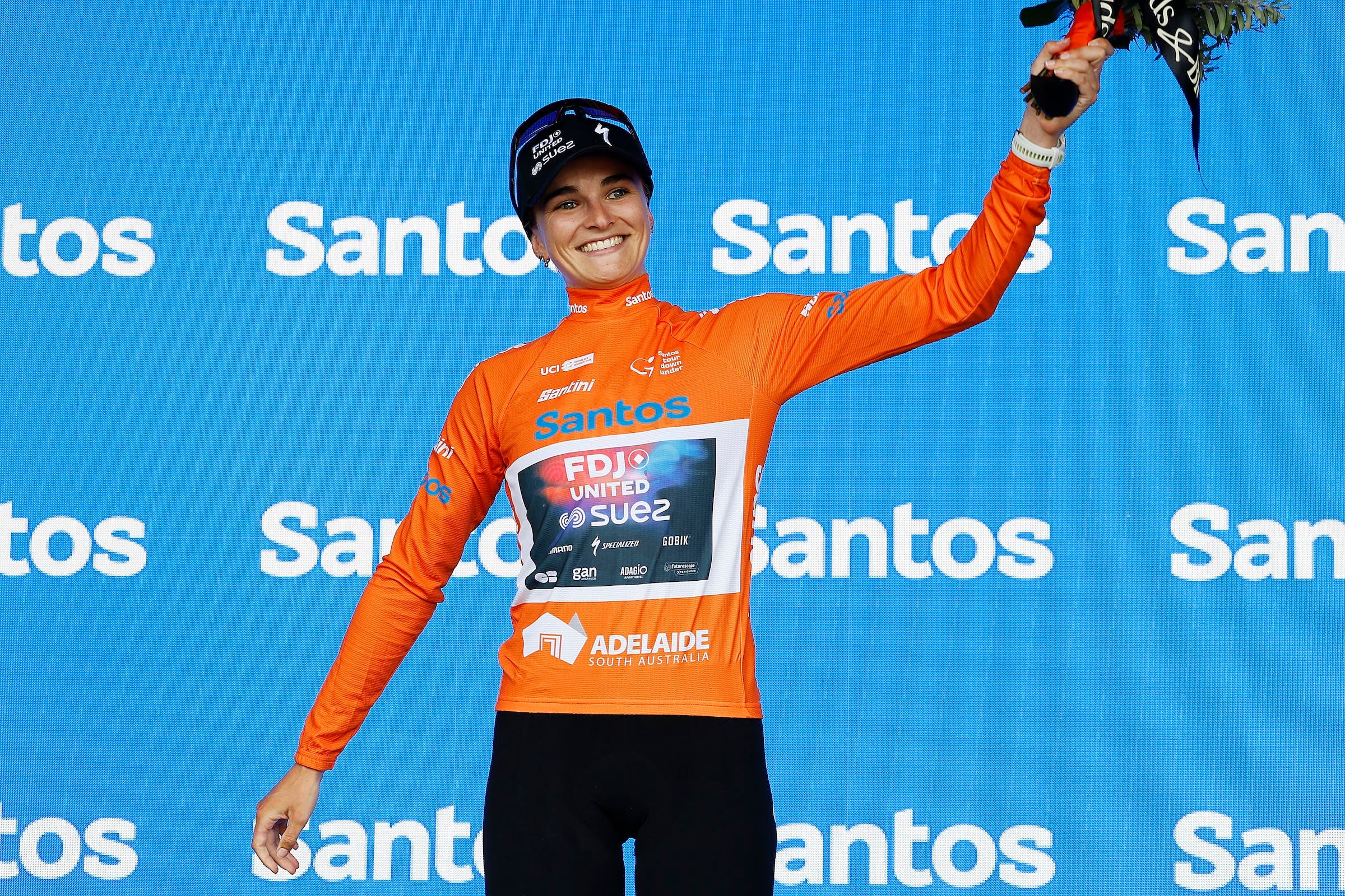 Ally Wollaston of New Zealand and Team FDJ United - SUEZ celebrates at podium as Orange Santos Leader's Jersey winner during the 10th Santos Women's Tour Down Under 2026, Stage 2 a 130.7km stage from Magill to Paracombe 410m / #UCIWWT / on January 18, 2026 in Paracombe, Australia. (Photo: Con Chronis/Getty Images)