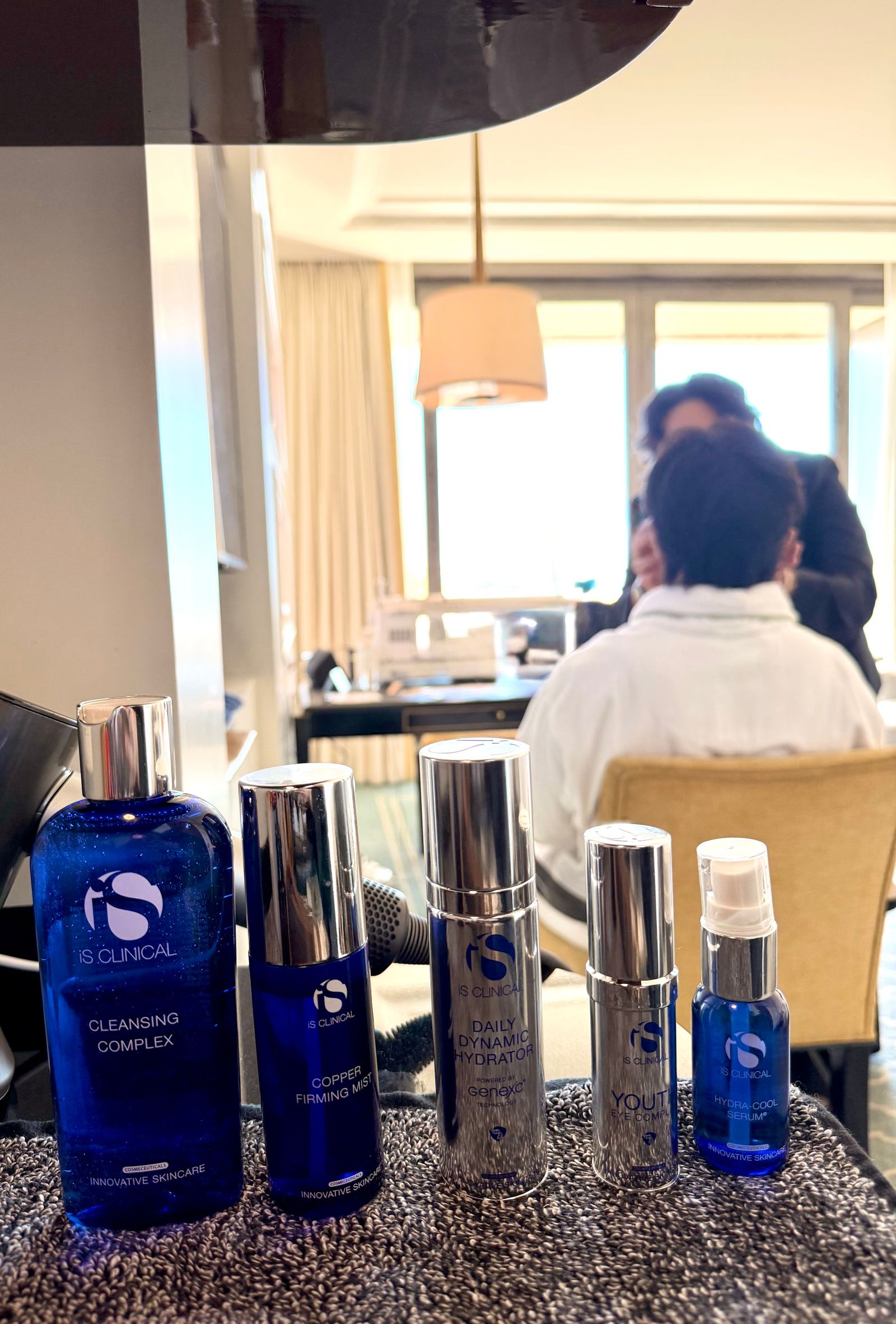 Image may contain La Parka Adult Person Cosmetics Bottle Perfume Lipstick Beauty Salon and Indoors