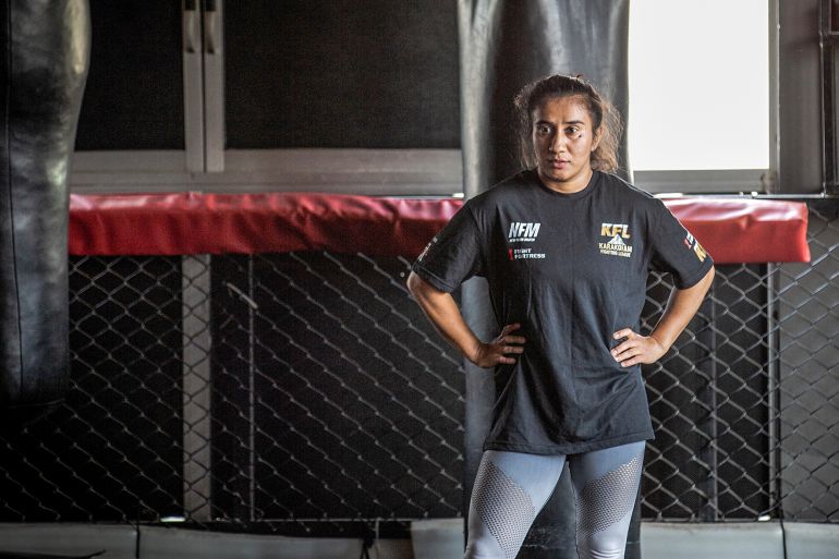 MMA fighter Anita Karim trains at a gym in Islamabad, Pakistan