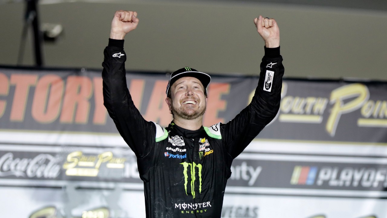 Kurt Busch celebrates after winning a NASCAR Cup Series race in Las Vegas. (Isaac Brekken/AP)