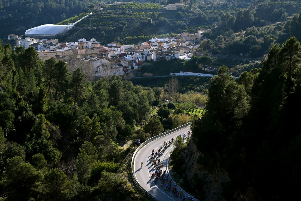 ALTEA, SPAIN - FEBRUARY 01: A general view of the peloton compete climbing to the Coll de Rates (622m) during the 74th Volta a la Comunitat Valenciana 2023 - Stage 1 a 189,4km stage from Orihuela to Altea / #VCV2023 / #VoltaValenciana / on February 01, 2023 in Altea, Spain. (Photo by Dario Belingheri/Getty Images)