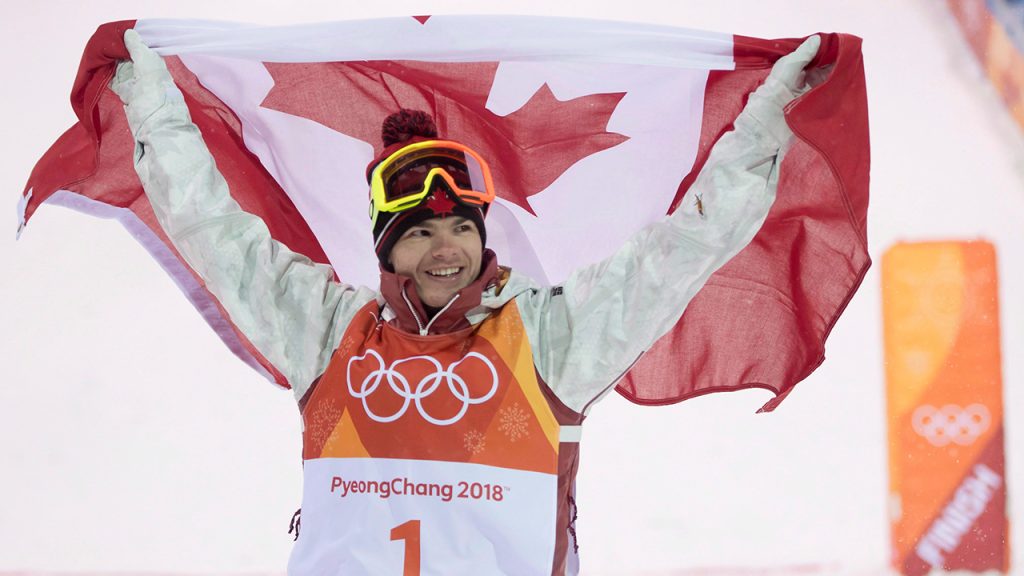 Canadian Mikael Kingsbury celebrates winning his gold medal in the moguls finals at the Pyeongchang 2018 Winter Olympic Games. (Jonathan Hayward/CP).