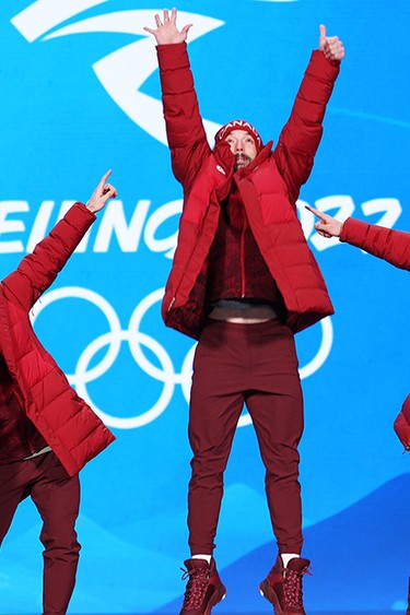 Team Canada celebrate winning the men's 5000m relay in speed skating at the Beijing Games on Feb. 17, 2022.